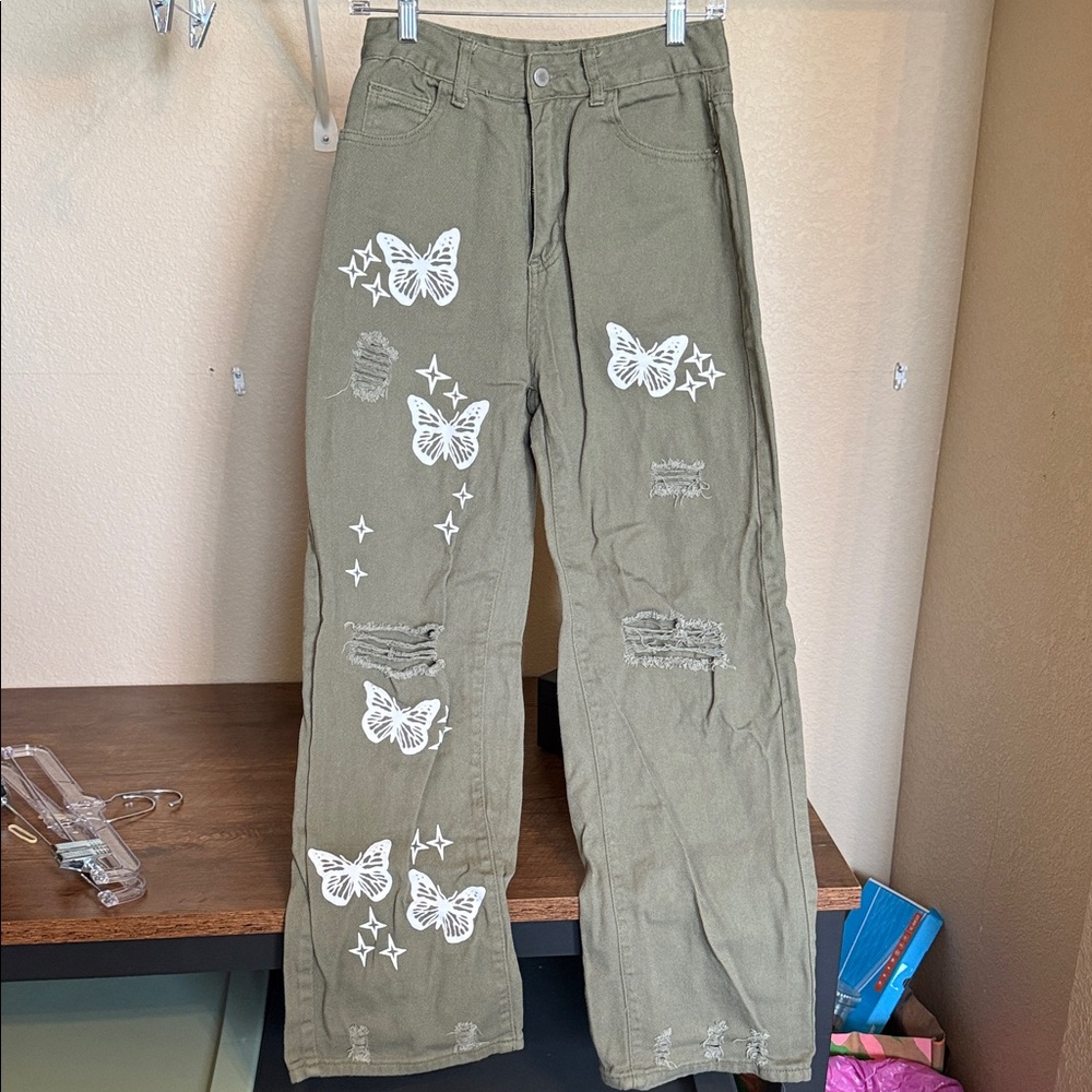 SHEIN Distressed Olive Trousers with White Butterfly Motif
